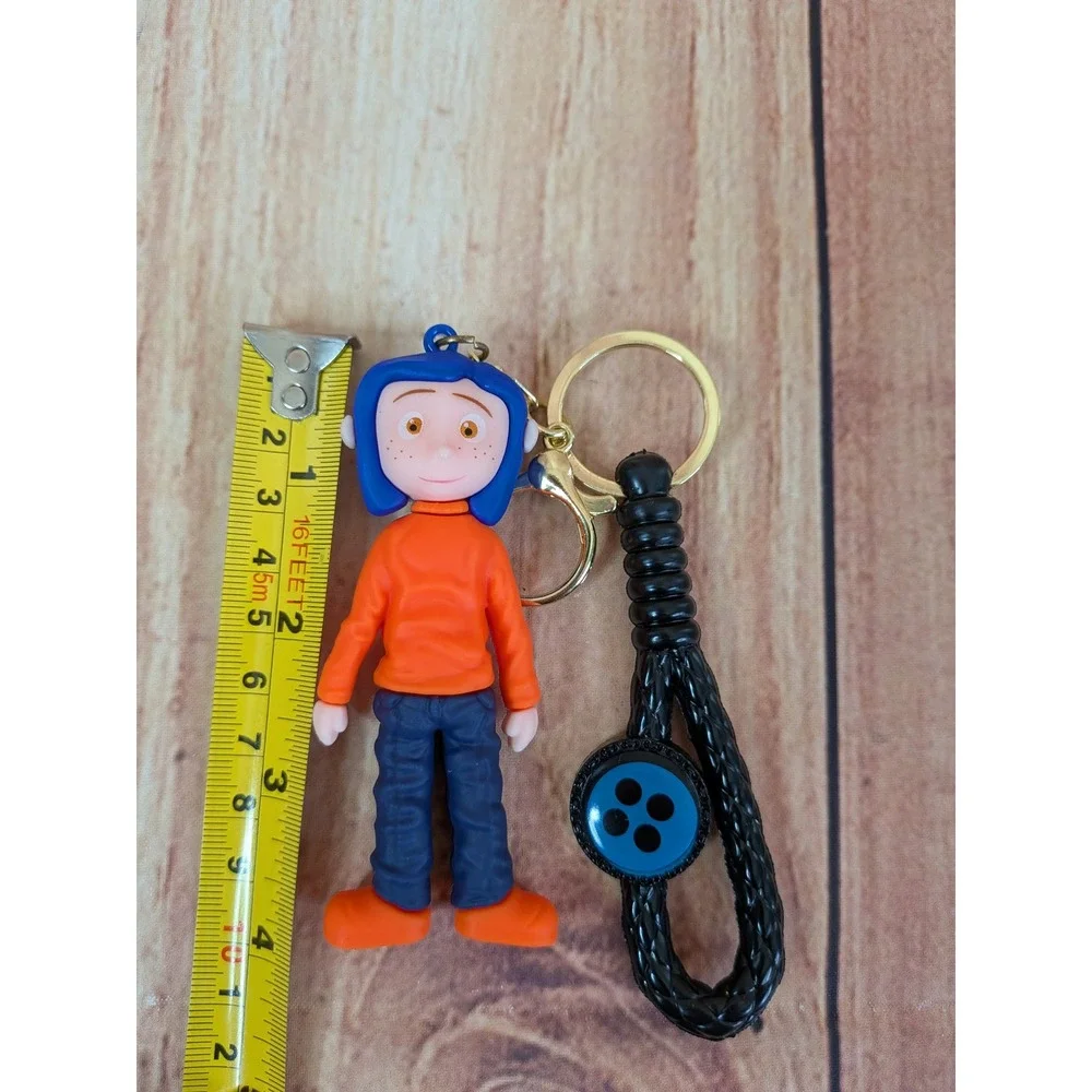 Coraline Mood Doll 3D Keychain with Blue Hair Orange‎ Shirt Button Accessory